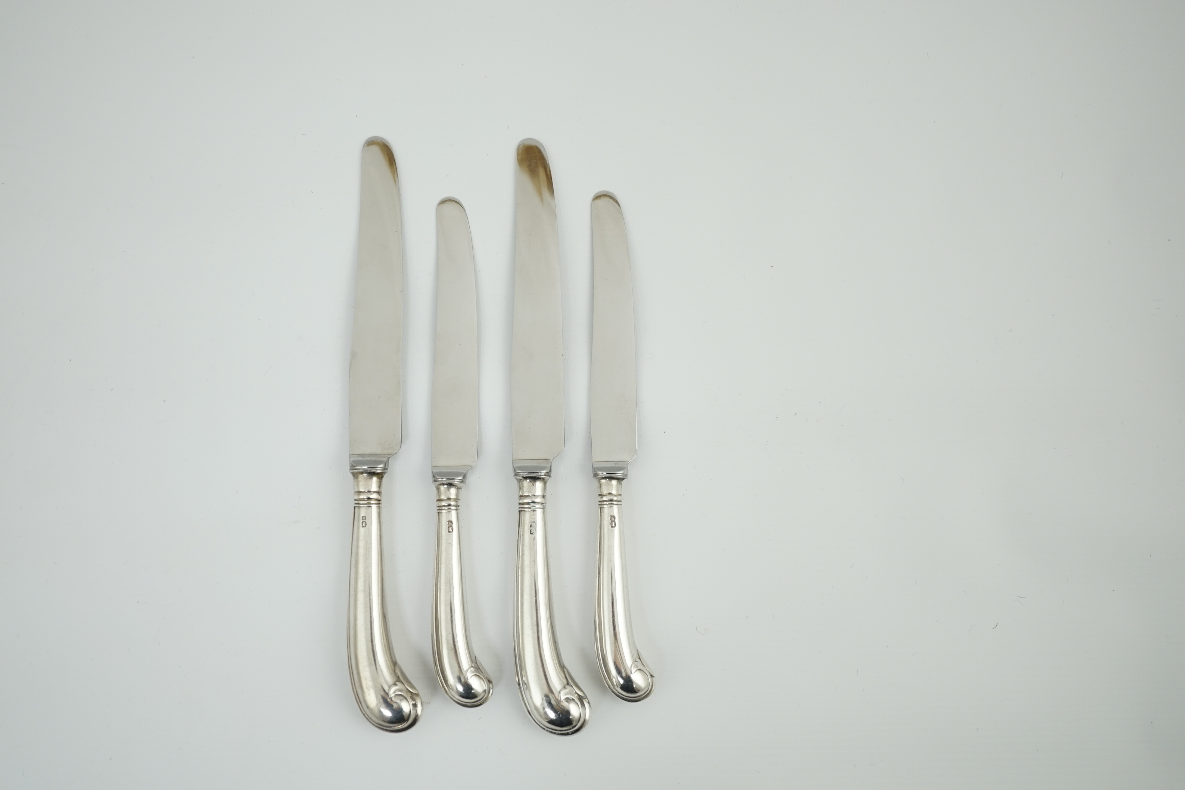 A set of six Elizabeth II silver handled table knives and six dessert knives, by George Howson